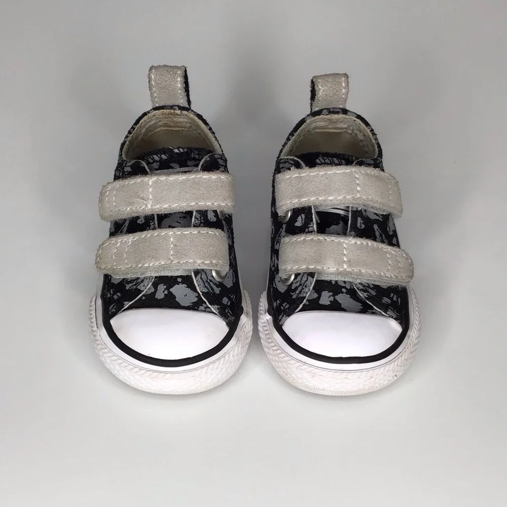 Converse Chuck Taylor All Star 2V Black and Gray Leopard Print Sneakers.
